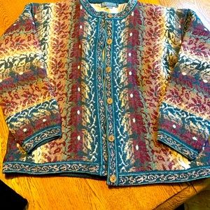 Icelandic design button down cardigan. 95%wool, 5% rayon.